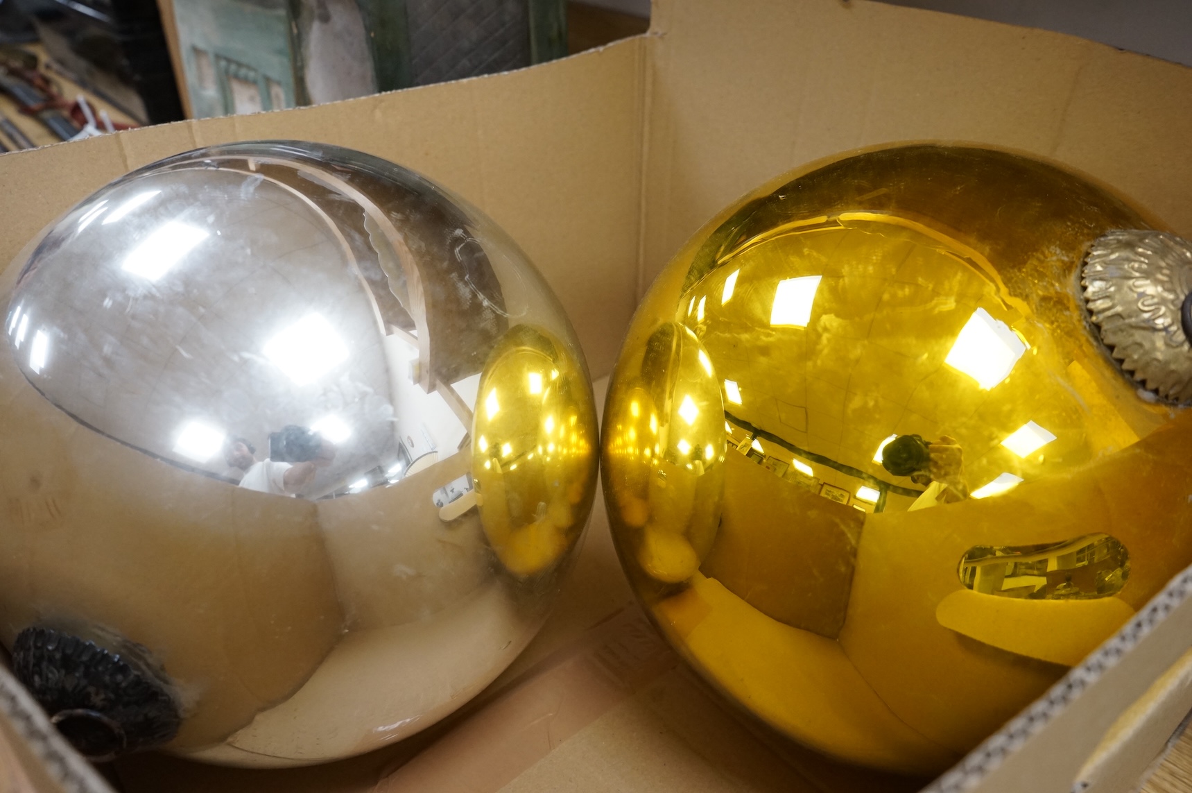 Two large witches balls, one silver and one gold, circumference approx. 82cm